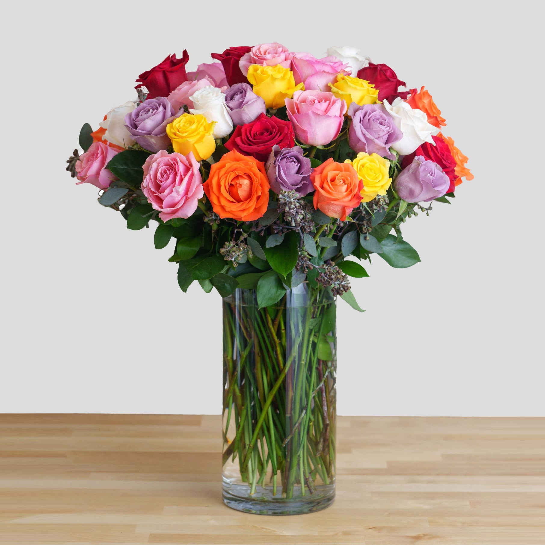 Mixed Color Roses in a Glass Vase